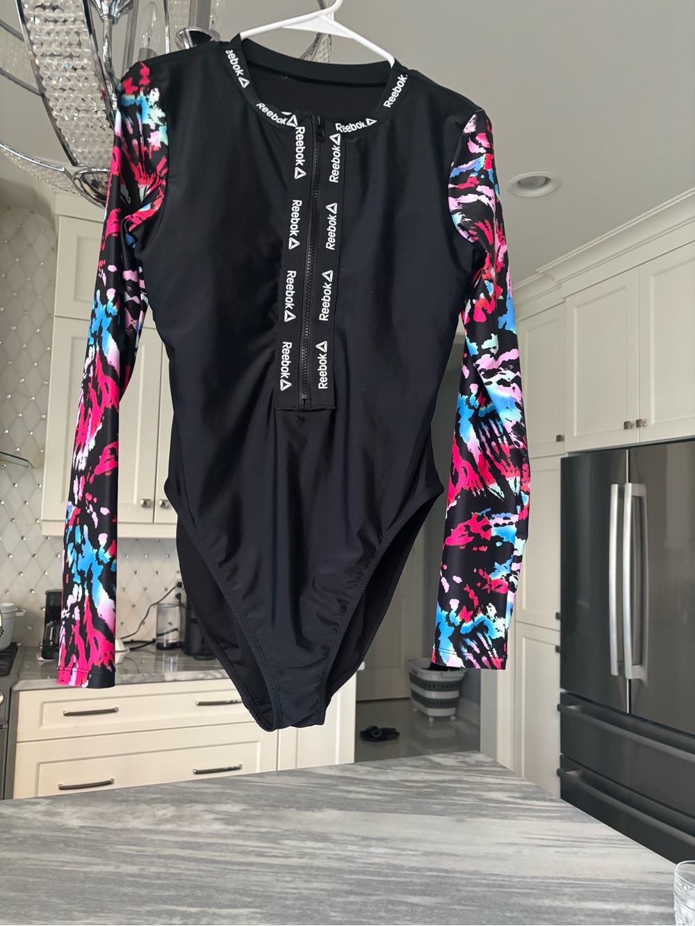 Reebok Black Long-Sleeve One-Piece Swimwear with Pink & Blue Print Sleeves